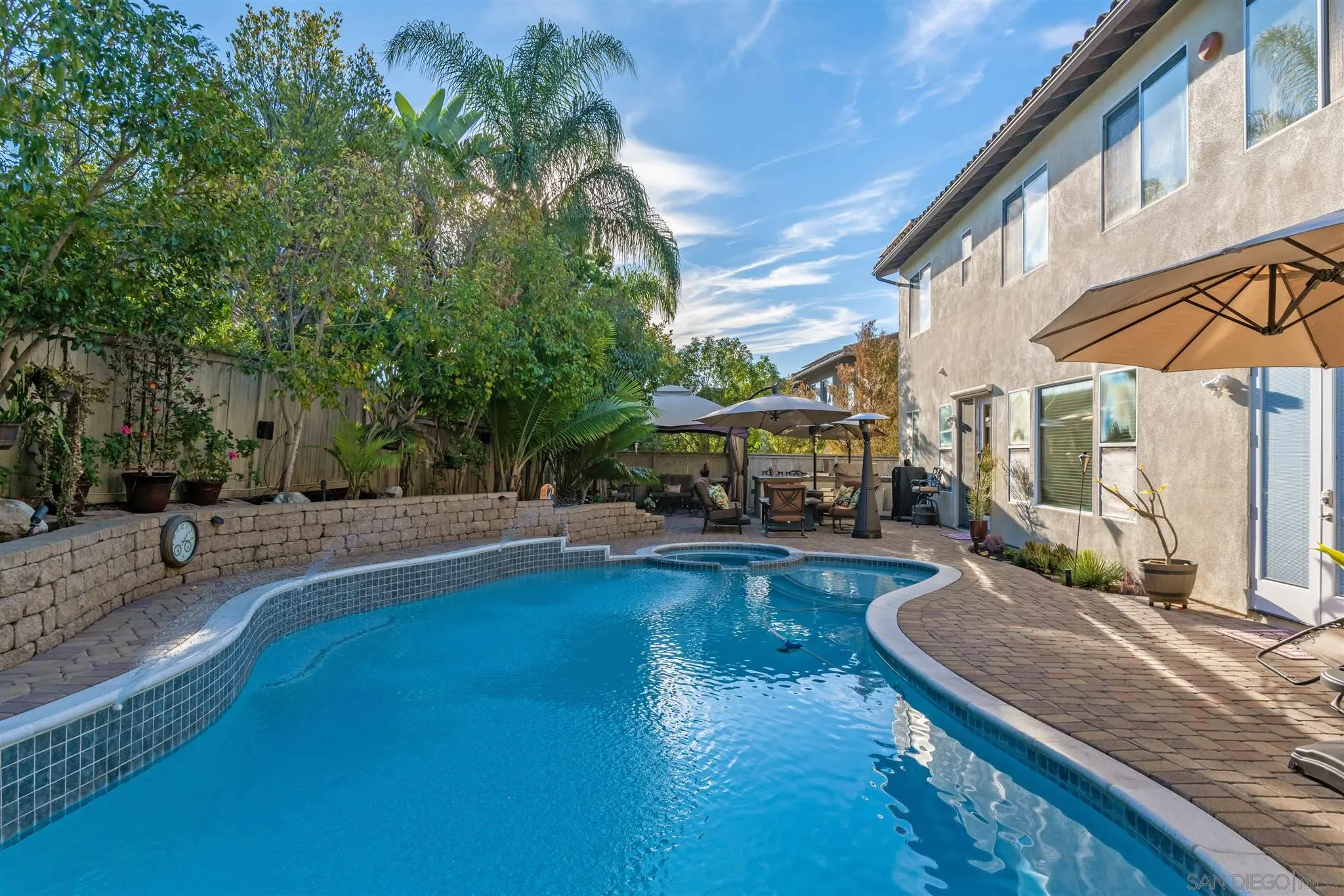 16333 Deer Ridge Road San Diego, CA 92127 - Photo 41 of 43 a view of a house with pool and sitting area