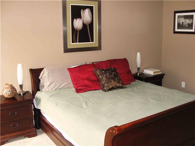 1025 Fulman Road Hendersonville, TN 37075 - Photo 2 of 11 a bedroom with a bed and painting on the wall