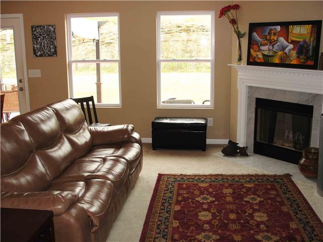 1025 Fulman Road Hendersonville, TN 37075 - Photo 3 of 11 a living room with furniture and a fireplace