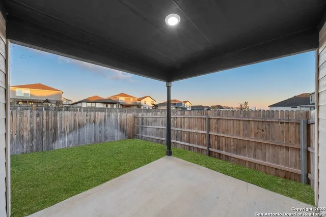 a view of a backyard with a garden