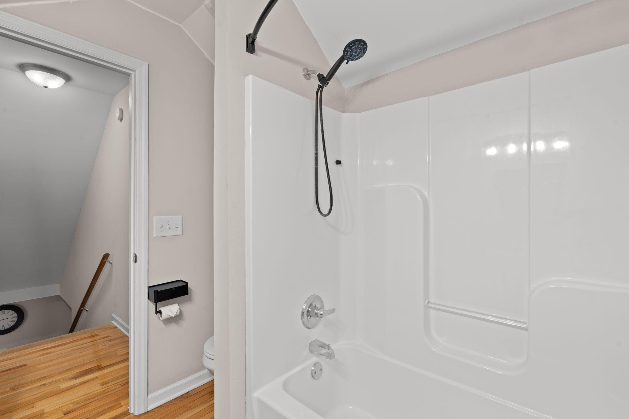 439 Town Creek Road Benton, TN 37307 - Photo 23 of 30 a bathroom with a bathtub and a shower