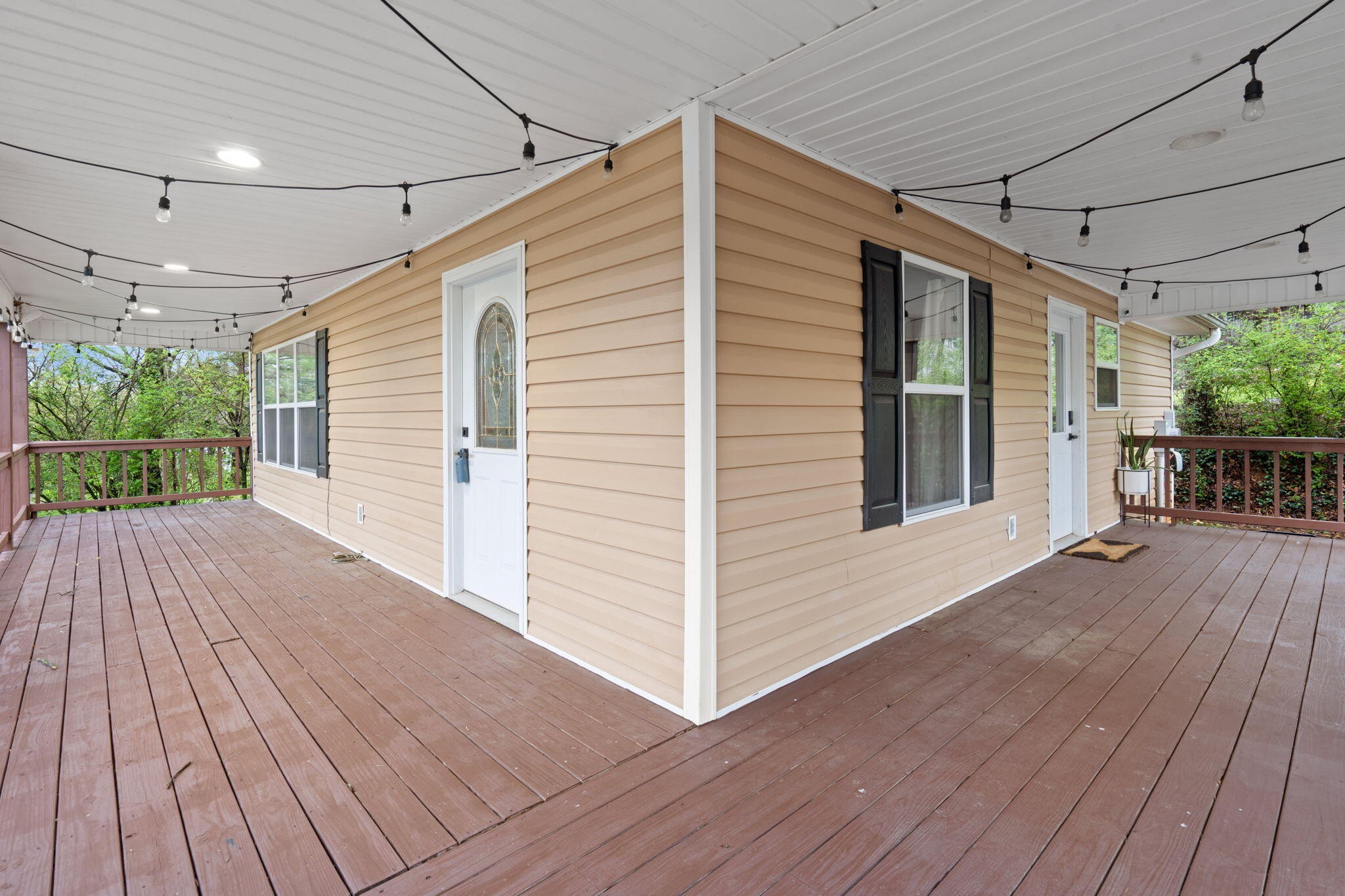 439 Town Creek Road Benton, TN 37307 - Photo 28 of 30 a view of a house with wooden deck