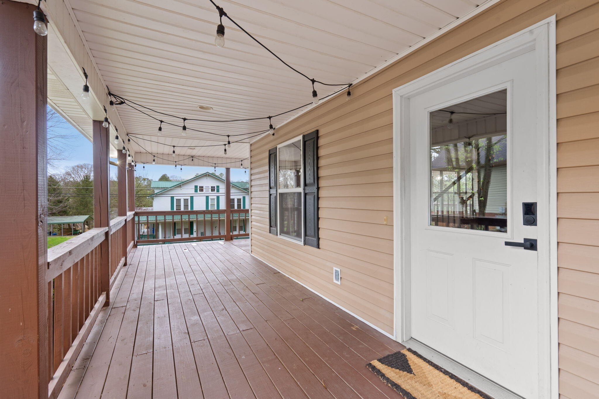 439 Town Creek Road Benton, TN 37307 - Photo 29 of 30 a view of a balcony with wooden floor