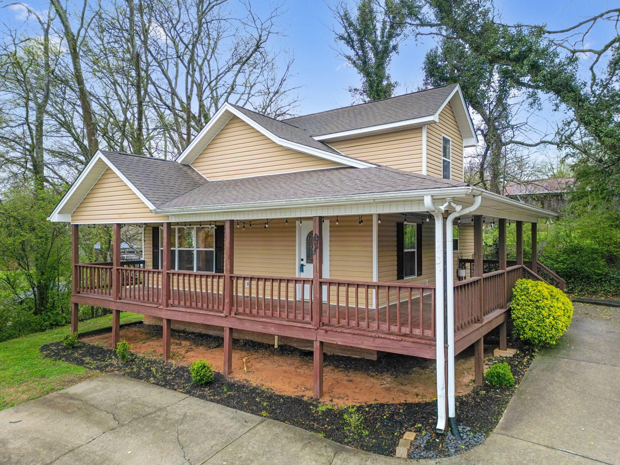 439 Town Creek Road Benton, TN 37307 - Photo 3 of 30 a view of a house with a yard and a fence