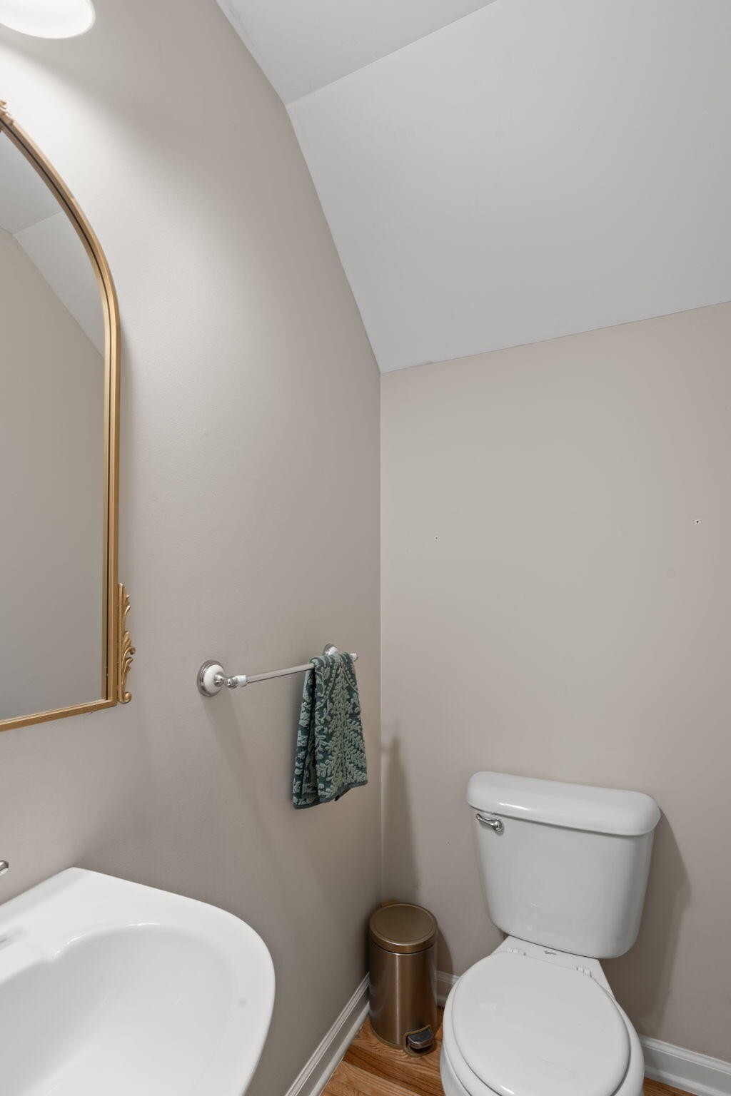 439 Town Creek Road Benton, TN 37307 - Photo 9 of 30 a white toilet sitting next to a white sink