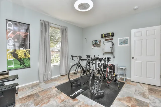a view of a room with gym equipment