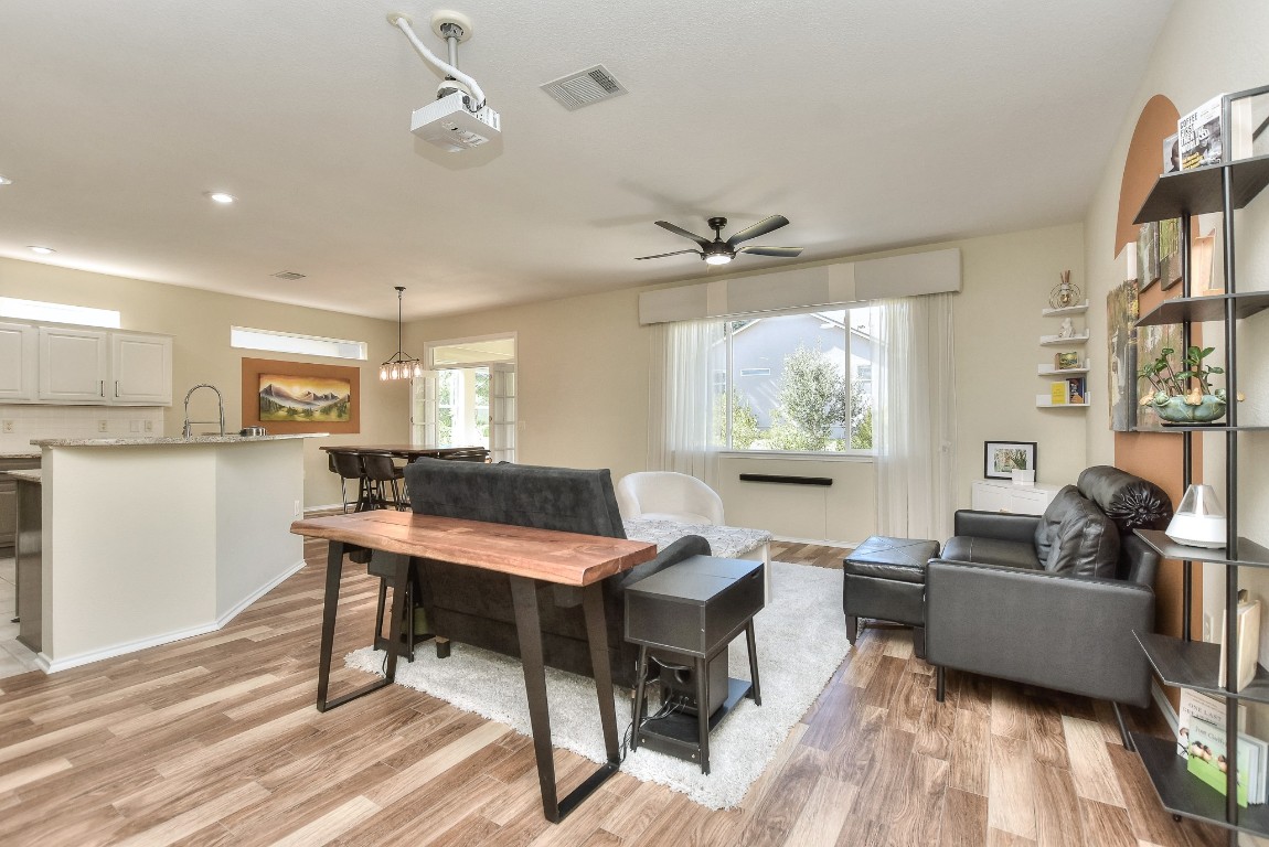 116 Dandelion Drive Georgetown, TX 78633 - Photo 5 of 31 Living room featuring ceramic tile flooring, plenty of natural light, ceiling fan, and recessed lighting