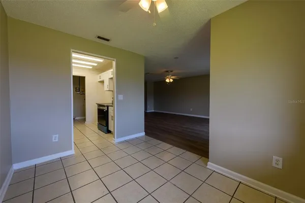 a view of a hallway with closet
