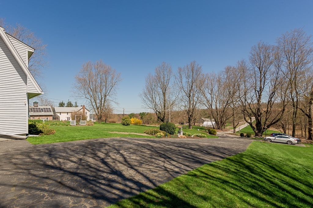 127 West Millbury Road Sutton, MA 01590 - Photo 26 of 32 a view of a yard with large trees