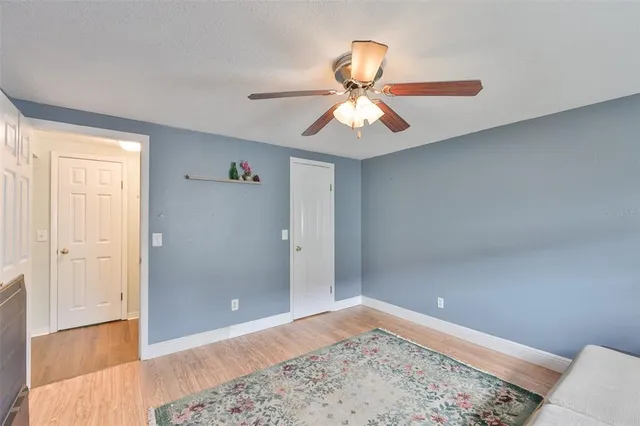 a view of a livingroom with a ceiling fan