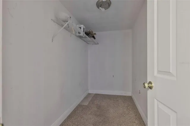 a view of a room with rack on the wall