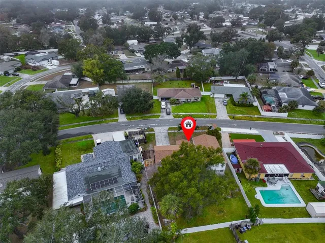 an aerial view of a tennis ground and tennis court