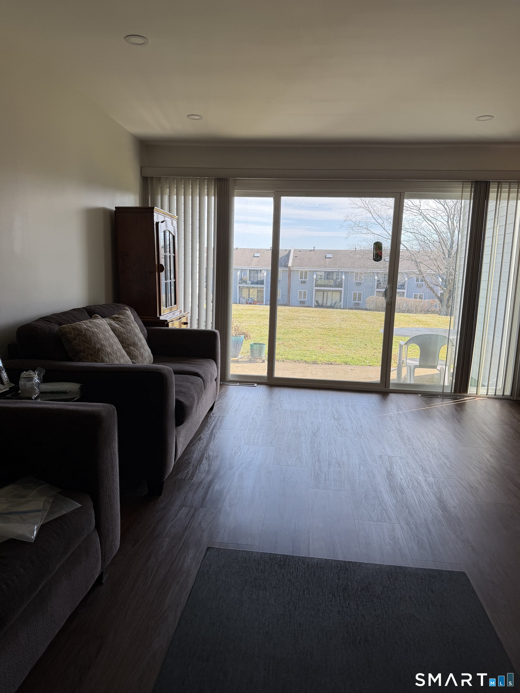 131 Florence Road, Unit 1C Branford, CT 06405 - Photo 15 of 18 a living room with a large window