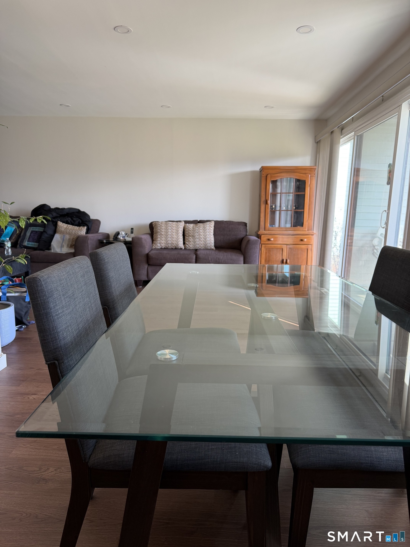 131 Florence Road, Unit 1C Branford, CT 06405 - Photo 8 of 18 a living room with furniture and a lamp