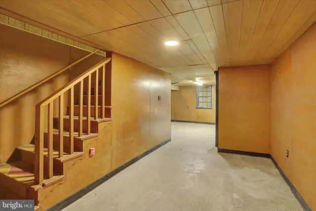 a view of a street with a building in the background