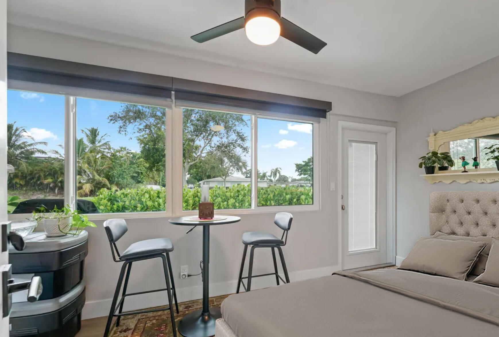 277 West High Point Court, Unit B Delray Beach, FL 33445 - Photo 32 of 46 sunroom with bed