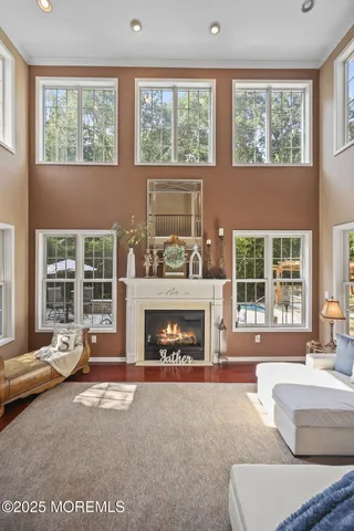 a kitchen with kitchen island granite countertop wooden cabinets and stainless steel appliances
