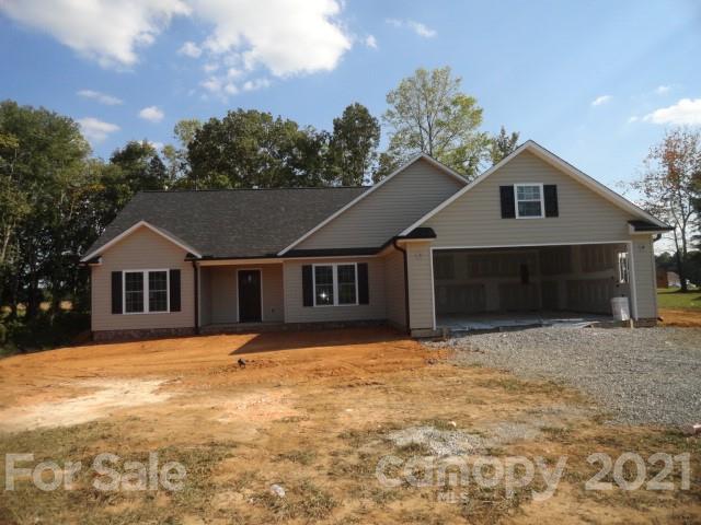 2508 Claremont Road Newton, NC 28658 - Photo 2 of 14 a front view of a house with a yard