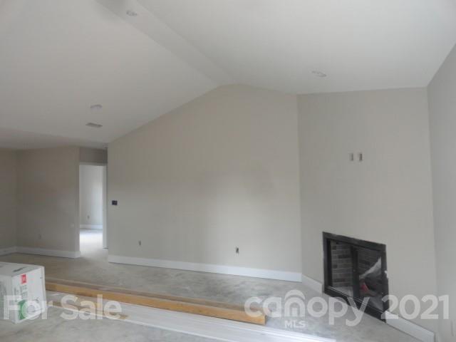 2508 Claremont Road Newton, NC 28658 - Photo 11 of 14 a room with a bed and a couch
