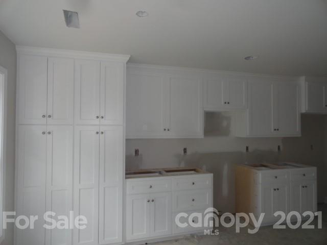 2508 Claremont Road Newton, NC 28658 - Photo 4 of 14 a kitchen with cabinets appliances