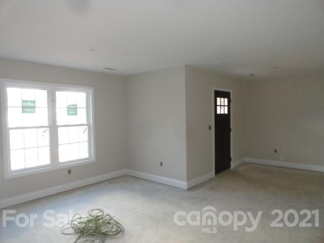 2508 Claremont Road Newton, NC 28658 - Photo 9 of 14 an empty room with windows