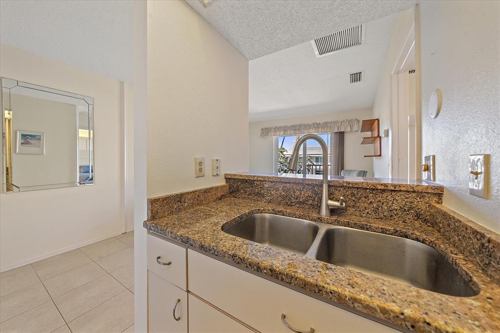 902 Gibbs Road, Unit 282 Venice, FL 34285 - Photo 7 of 19 a close view of sink and tap