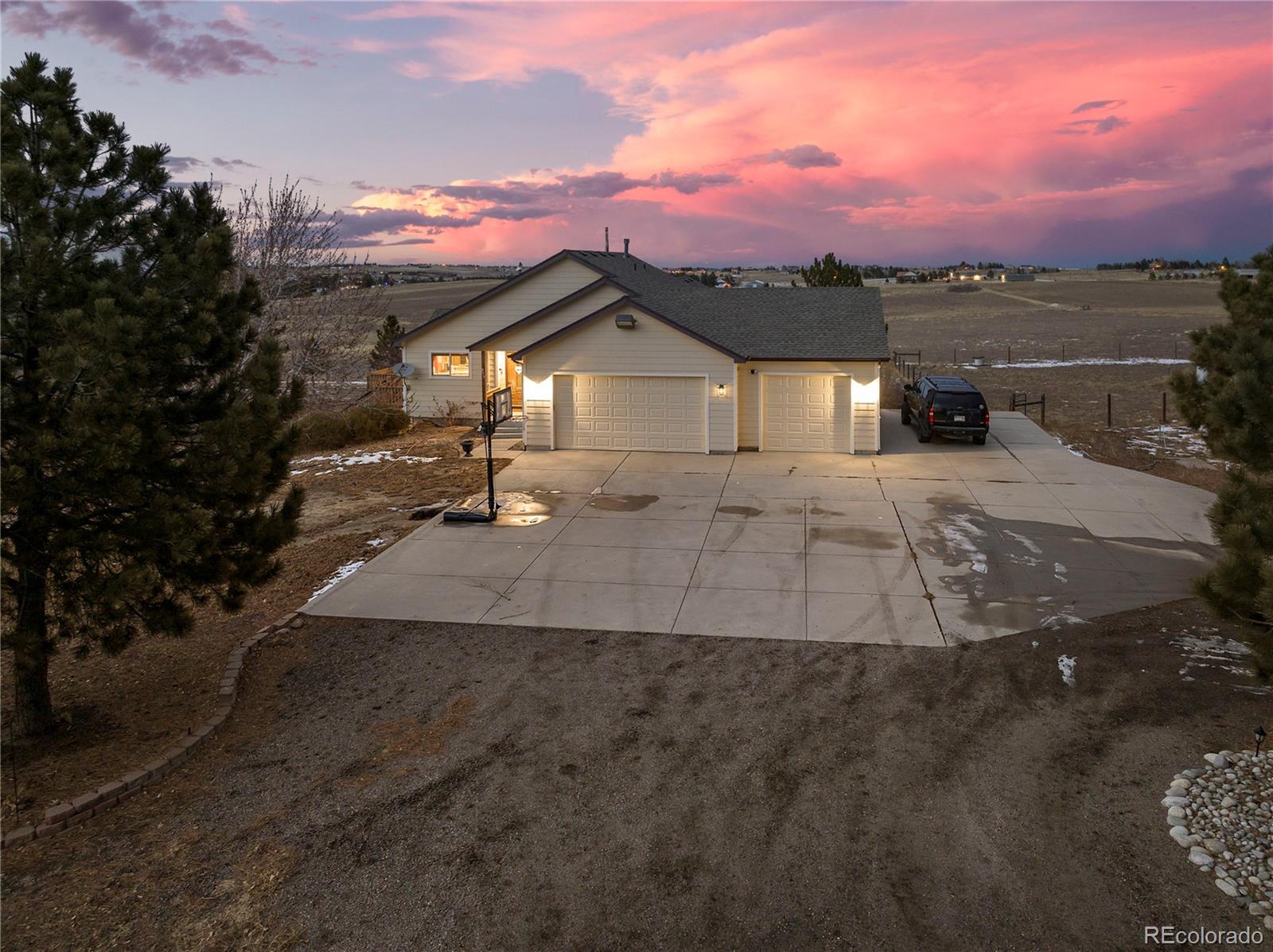 855 Gregory Circle Parker, CO 80138 - Photo 3 of 37 a view of a street in front of the house