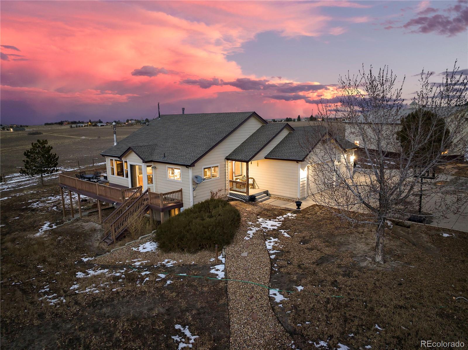 855 Gregory Circle Parker, CO 80138 - Photo 35 of 37 a view of a street with sunset view