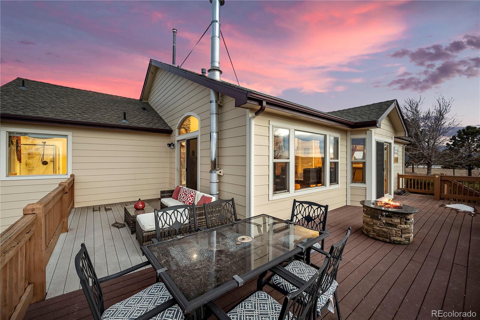 855 Gregory Circle Parker, CO 80138 - Photo 4 of 37 a front view of house with outdoor seating