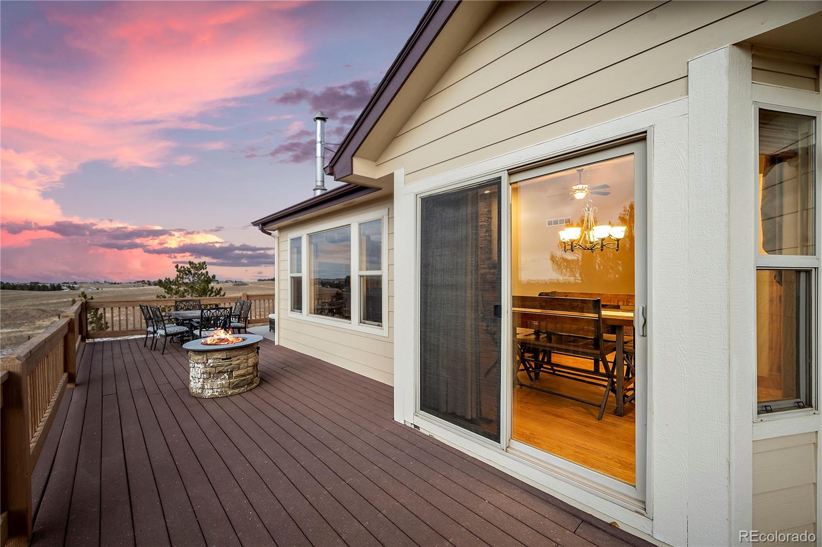 855 Gregory Circle Parker, CO 80138 - Photo 5 of 37 a view of a patio with chair and tables