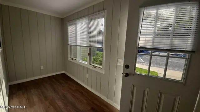 a view of hallway with windows