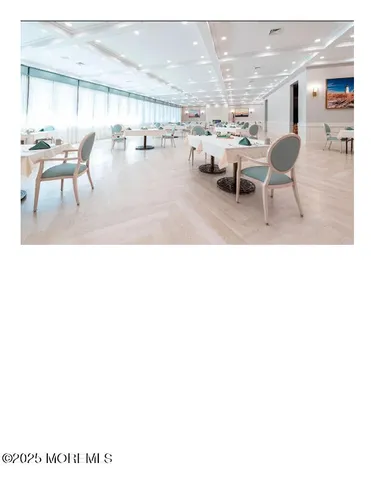 a balcony with chairs and view of living room