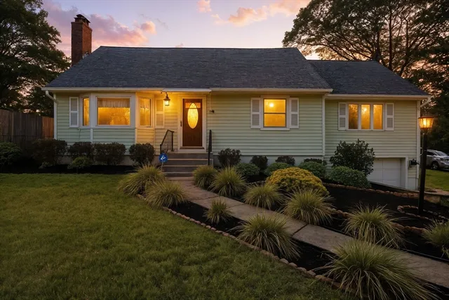 a backyard of a house with lots of green space