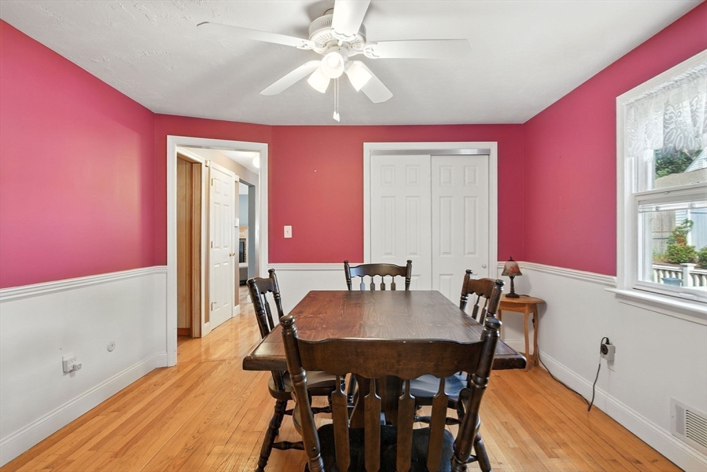 77 Bowers Street West Springfield, MA 01089 - Photo 13 of 36 a view of a dining room with furniture and wooden floor