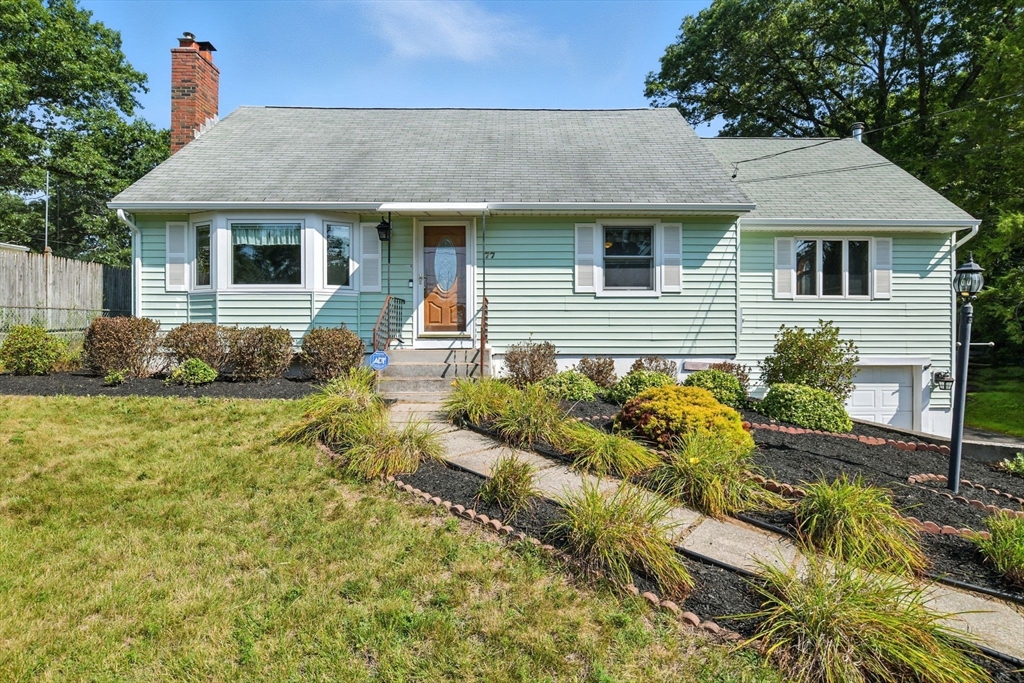 77 Bowers Street West Springfield, MA 01089 - Photo 2 of 36 a front view of a house with a yard