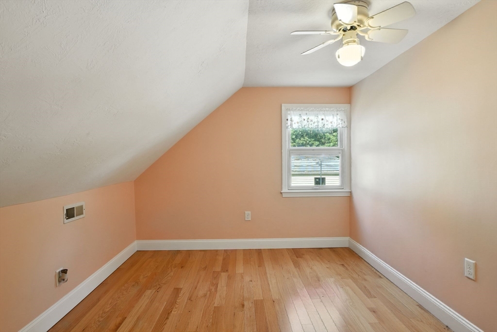 77 Bowers Street West Springfield, MA 01089 - Photo 26 of 36 a view of a room with wooden floor and window