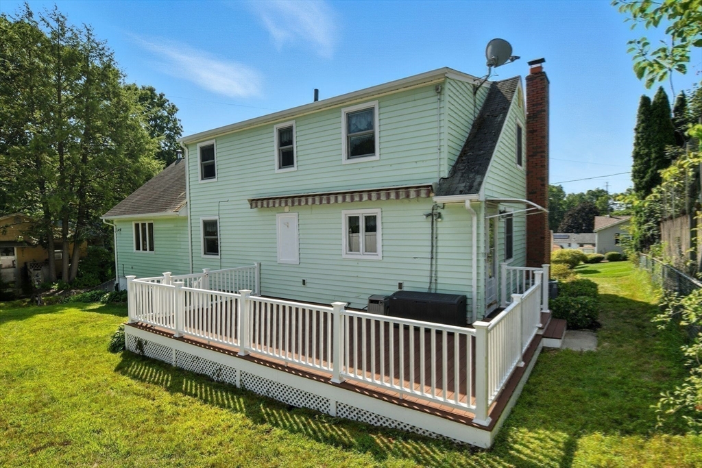 77 Bowers Street West Springfield, MA 01089 - Photo 31 of 36 a front view of a house with a yard