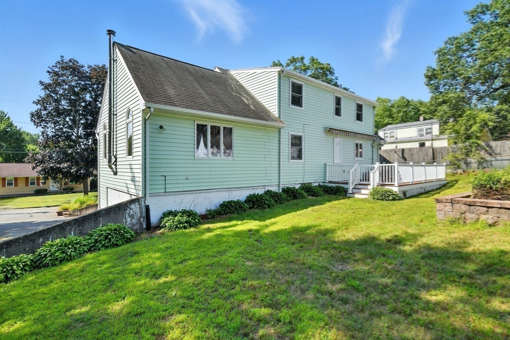 77 Bowers Street West Springfield, MA 01089 - Photo 33 of 36 a front view of a house with a yard