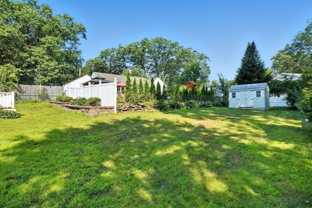 77 Bowers Street West Springfield, MA 01089 - Photo 34 of 36 a view of a tiny house with a yard