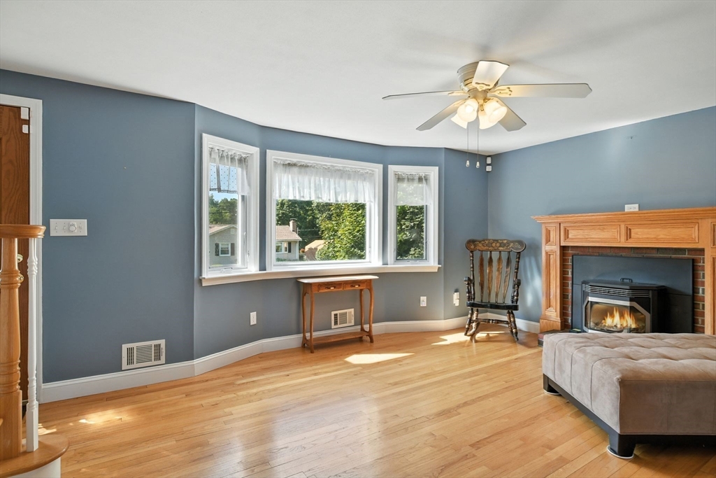 77 Bowers Street West Springfield, MA 01089 - Photo 5 of 36 a living room with furniture and a fireplace