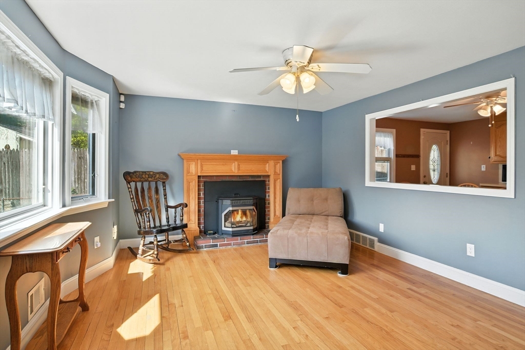 77 Bowers Street West Springfield, MA 01089 - Photo 6 of 36 a living room with furniture and a fireplace