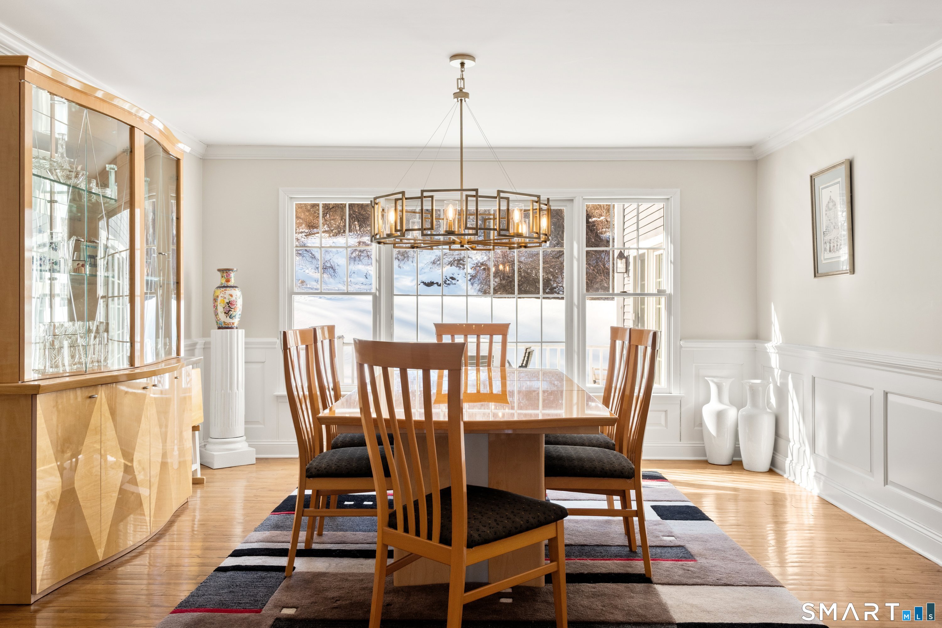 309 Sturges Ridge Road Wilton, CT 06897 - Photo 12 of 33 a view of a dining room with furniture wooden floor and next to a window