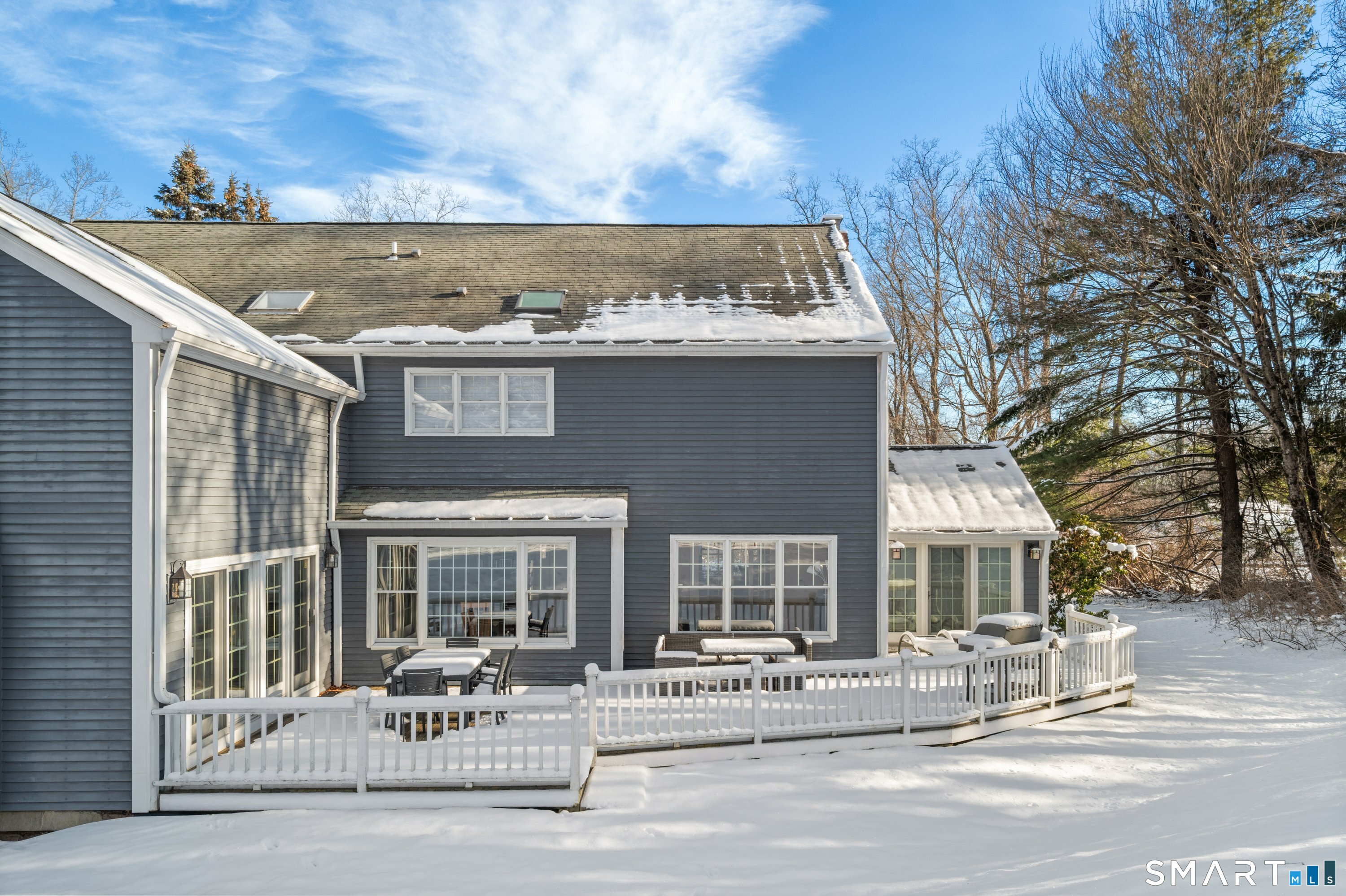 309 Sturges Ridge Road Wilton, CT 06897 - Photo 19 of 33 a front view of a building with a garden and plants