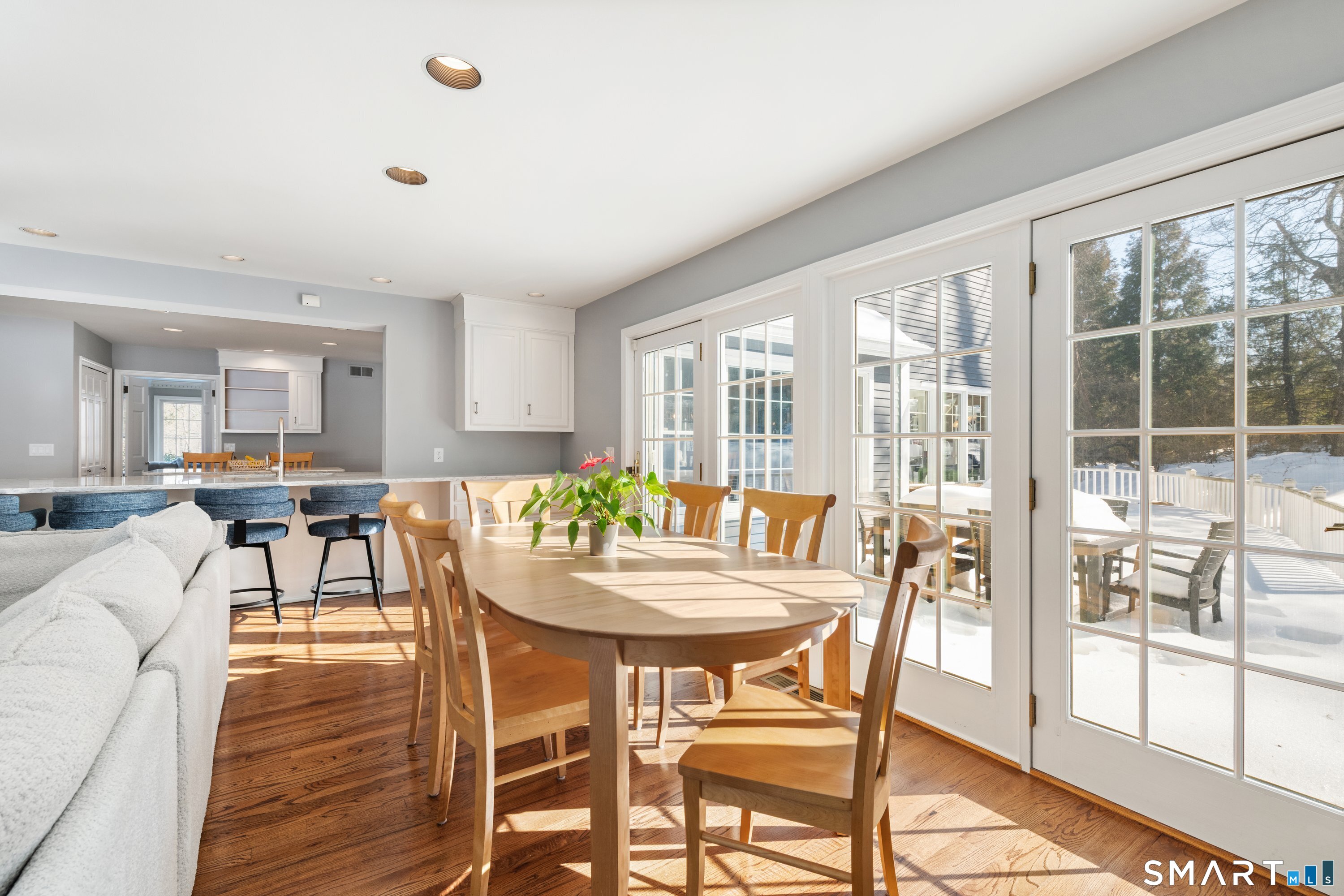 309 Sturges Ridge Road Wilton, CT 06897 - Photo 2 of 33 a view of a dining room with furniture and wooden floor