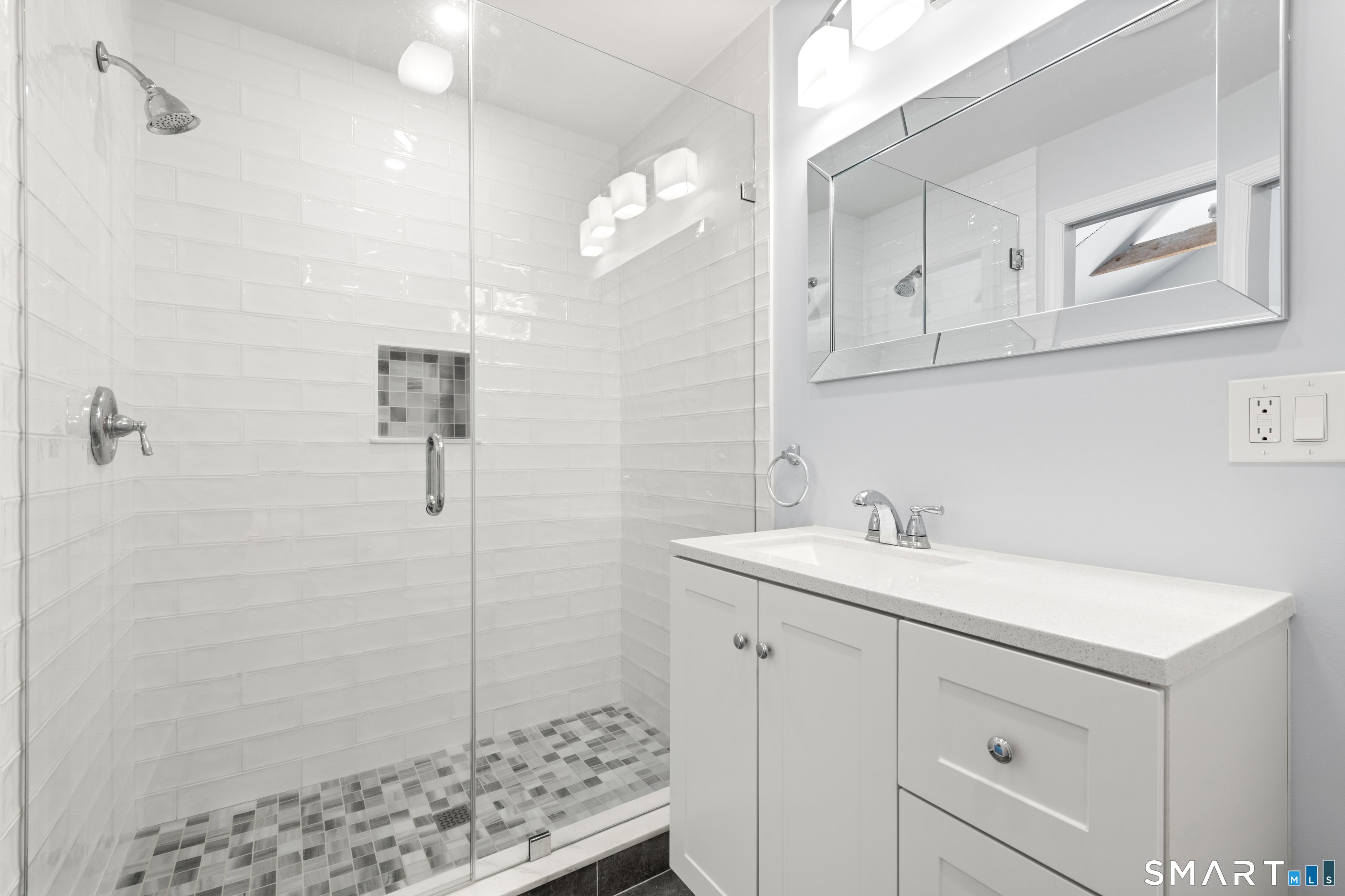 309 Sturges Ridge Road Wilton, CT 06897 - Photo 26 of 33 a bathroom with a sink a vanity and a mirror