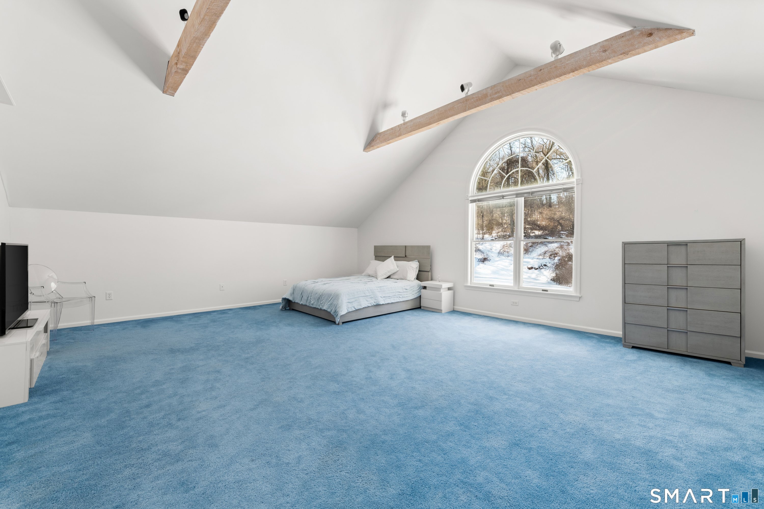 309 Sturges Ridge Road Wilton, CT 06897 - Photo 27 of 33 an empty room with windows and cabinet