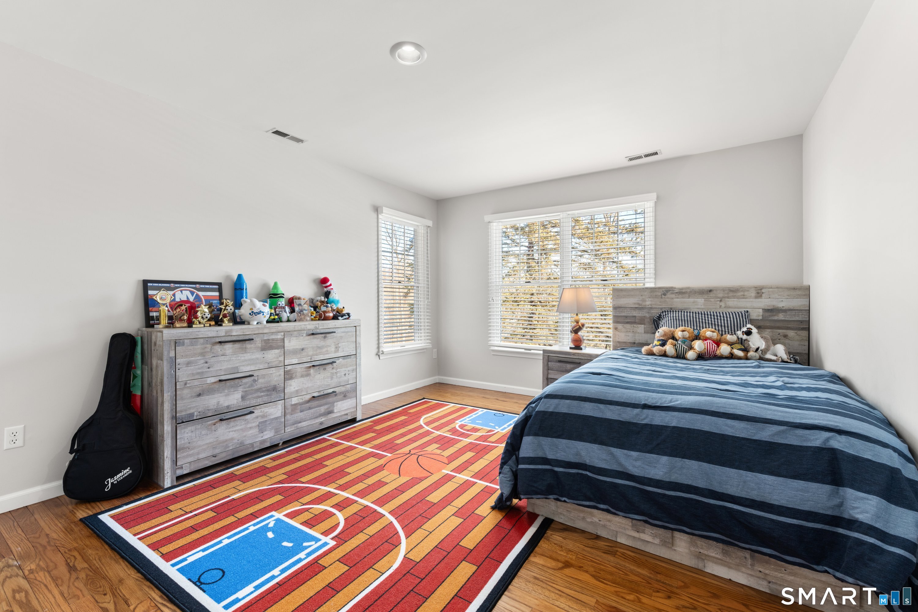 309 Sturges Ridge Road Wilton, CT 06897 - Photo 29 of 33 a bedroom with a bed and a window