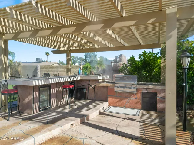 a view of a swimming pool with a patio