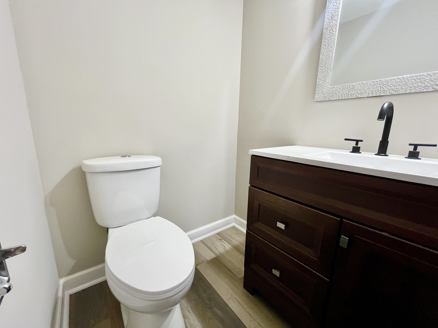 9725 Karlov Avenue, Unit 501 Oak Lawn, IL 60453 - Photo 14 of 17 a bathroom with a toilet and a sink