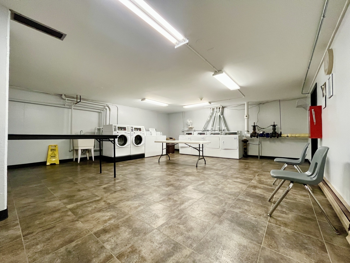 9725 Karlov Avenue, Unit 501 Oak Lawn, IL 60453 - Photo 16 of 17 a room with lots of furniture and white walls